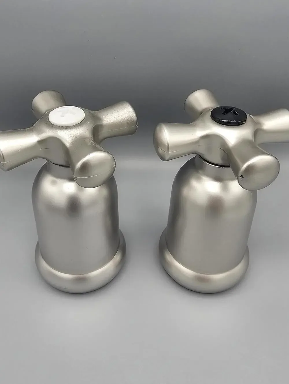 Set of Two Silver salt and pepper shakers with Cross Design